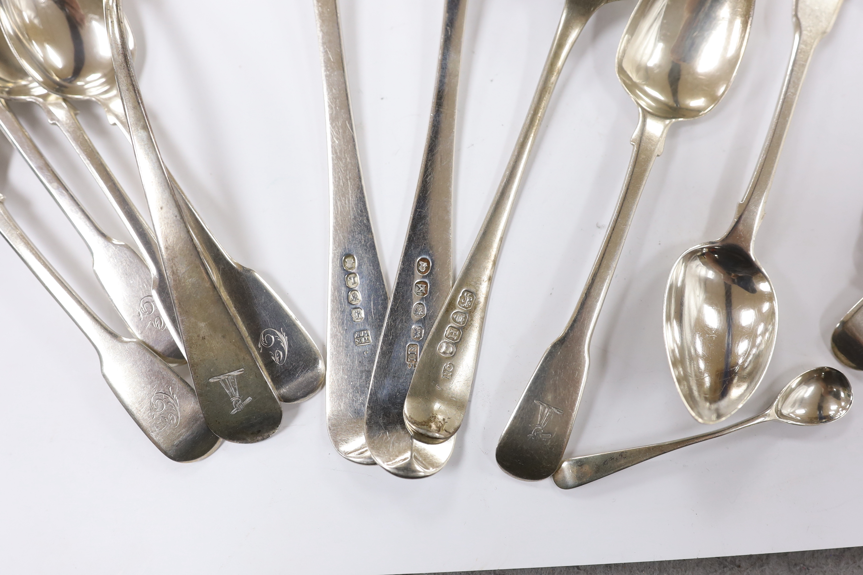 Fourteen assorted 19th century silver spoons, including table, tea and condiment and part of another silver spoons, 12.2oz.